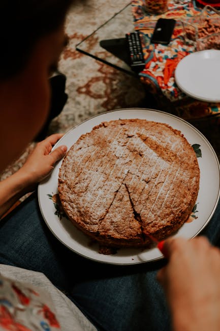 Cutting a cake or pie on a plate